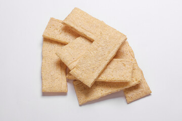 Diet whole grain bread crispy crackers on white background