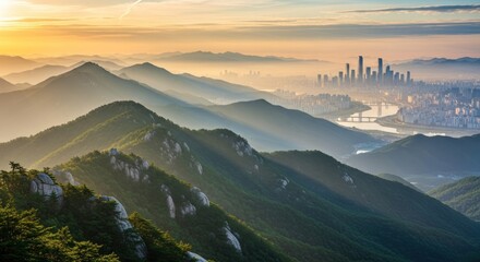 Breathtaking Sunrise Over Layered Mountain Range and Hazy City Skyline with Dramatic Sunbeams