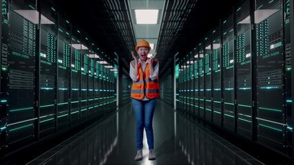 Full Body Of Asian Female Engineer With Safety Helmet Smiling To Camera And Saying Wow While Standing in Server Room Data Center - Powered by Adobe