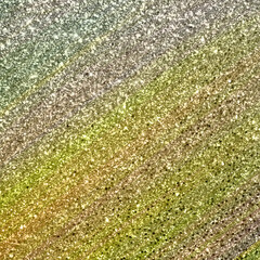 Closeup of fresh green grass texture and leaf pattern against a natural water background