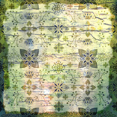 Vintage grunge floral pattern design on old paper texture for a seamless spring wallpaper background