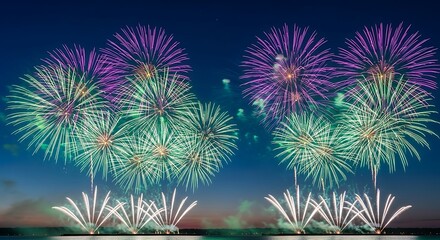 Fototapeta premium Vibrant Fireworks Display Illuminates Night Sky Over Calm Water with Stunning Colors