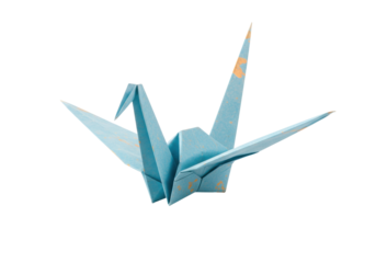 Blue origami crane isolated PNG on transparent background, traditional Japanese folded paper art for peace and good luck