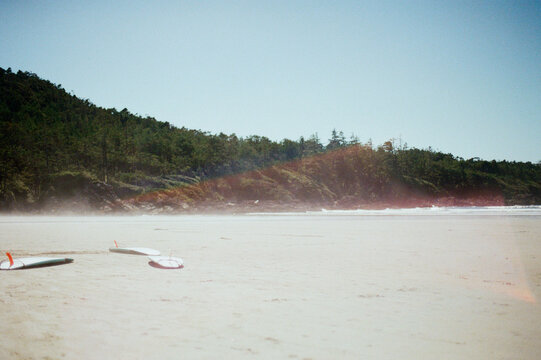 surfboards resting on the beach