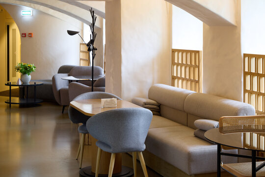 Modern lounge area with comfortable seating and soft lighting