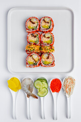 Sushi roll with shrimp, mango and cream cheese