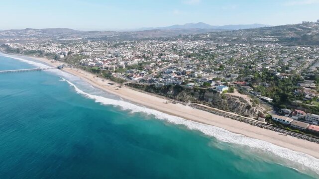 Drone Flying Toward San Clemente Beach Shore in Early Morning