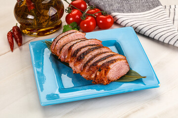 Sliced duck breast baked with cherry