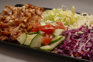 Vegetable salad served as a meal, showing fresh ingredients mixed together and reflecting healthy nutrition and everyday dining culture.