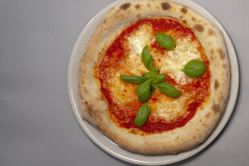 Italian pizza in close up, showing detailed toppings and texture, reflecting Mediterranean cuisine