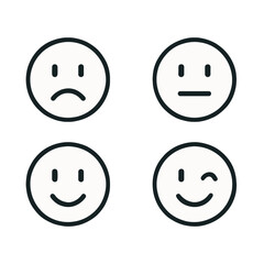 Set of simple face emoticons showing different emotions: happy, sad, neutral, and wink.