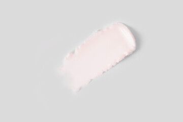 Soft pink cream texture on light background
