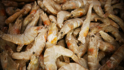 Close-up of many frozen king prawns
