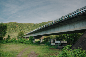 Bato Bridge Spanning Verdant Hillside in Landscape | Bato, Catanduanes, Philippines