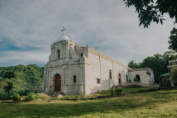 Naklejka premium Historic White Stone Colonial Church Set in Bato, Catanduanes, Bicol, Philippines