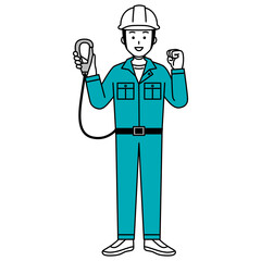 安全帯を装着する作業員の男性（全身）