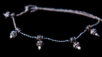 Dark silver chain bracelet with ornamental charms and beads jewelry closeup - oxidized metal accessory, vintage gothic style, elegant fashion bracelet, handcrafted silver, decorative jewelry, luxury o