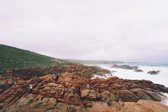horizon view looking over canal rocks in Yallingup, Western Australia, with frothy sea in background