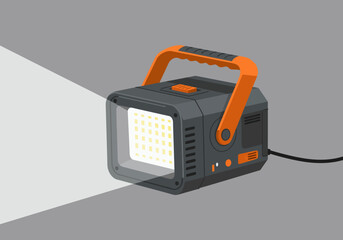 Portable rechargeable LED work light with orange handle.