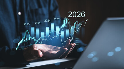 Businessman analyzing futuristic financial growth chart showing market trend projections from 2022 to 2026 with glowing bar graphs and candlesticks.