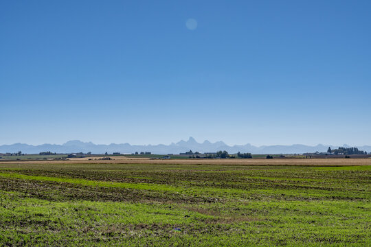 1100 N + E 1400 N, Ashton is a city in Fremont County, Idaho. Snake River Plain. The Teton Range is a mountain range of the Rocky Mountains in North America. 
