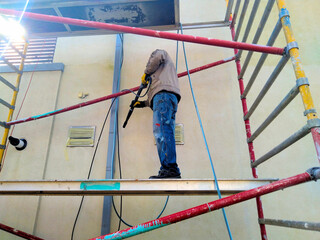 Repair of the facade of a private house, washing and painting the walls