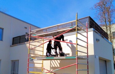 Repair of the facade of a private house, washing and painting the walls