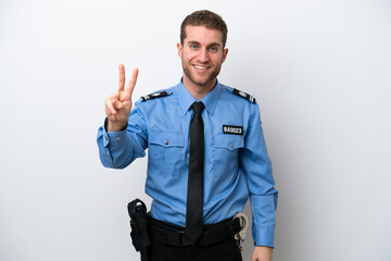 Young police caucasian man isolated on white background smiling and showing victory sign