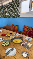 Traditional moroccan breakfast with omelette and mint tea