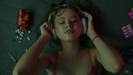 Vicious woman with drugs, cigarettes and pills