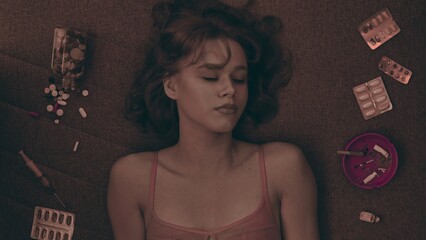 Vicious woman with drugs, cigarettes and pills