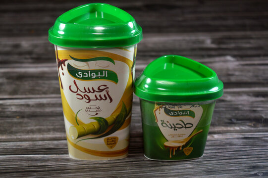 Cairo, Egypt, October 2 2025: El-Bawadi Tahini tahina, a paste made from ground sesame seeds, and molasses, a sweet syrup derived from sugarcane, a sweetener for desserts, baking and sugar alternative