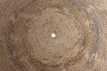 Dome ceiling in mausoleum of Samanid Mausoleum from baked brick in Bukhara, Uzbekistan. Built in the 10th century CE. UNESCO World Heritage Site