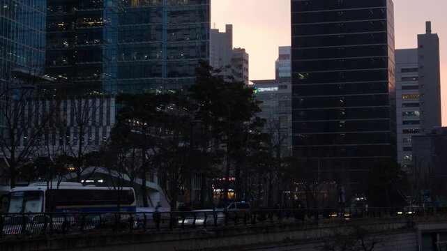 Seoul, South Korea. View of skyscrapers in Seoul, South Korea. Time-lapse during a cloudy sunset evening in spring, panning video