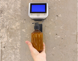 woman buying make up at cosmetics section in store. choosing cosmetics, perfumes, creams and shampoos, Using tester.	Barcode scanner,Self checkout machine