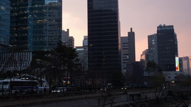 Seoul, South Korea. View of skyscrapers in Seoul, South Korea. Time-lapse during a cloudy sunset evening in spring, zoom in