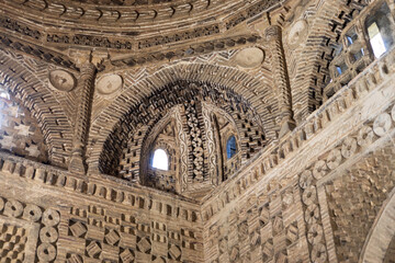 Interior detail with squinch of the Samanid Mausoleum in Bukhara, Uzbekistan. Building from baked brick decoration is combines multi-cultural ancient eastern motifs. Built in the 10th century CE