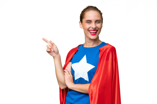 Super Hero caucasian woman over isolated background pointing finger to the side