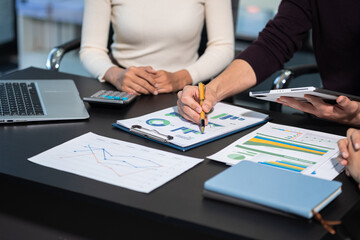 Project manager working and update tasks with milestones progress planning and professional investor working new start up project in the office.