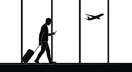 Silhouette of man with luggage looking at phone in airport with plane editable stock