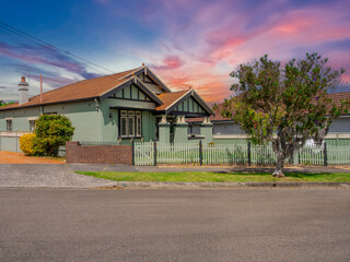 Beautiful colours of a Spring Sunset over Residential houses in inner Sydney suburb of Ashbury NSW Australia Double Brick federation house western sydney 