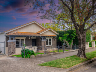 Beautiful colours of a Spring Sunset over Residential houses in inner Sydney suburb of Ashbury NSW Australia Double Brick federation house western sydney 