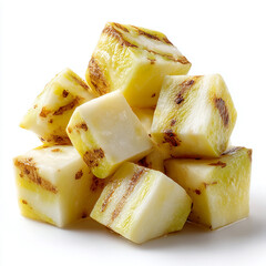 A close up shot of a pile of cubed pineapple pieces with white background in a studio setting