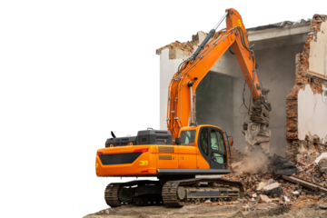 A large orange demolition excavator is breaking through a crumbling building wall in an isolated area. Dust and debris fill the air as it works.