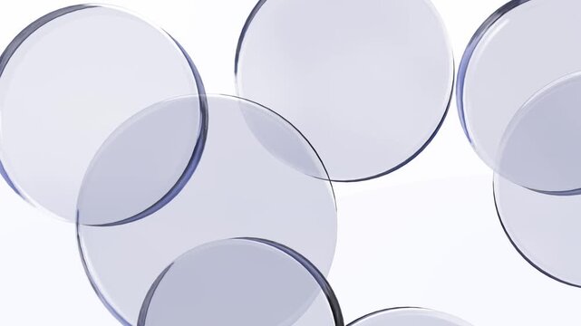 Seamless abstract looped animation of glass transparent circles on white background. Render disks. Floating glass circles animation - seamless loop for creative projects.  Gently float and overlap.