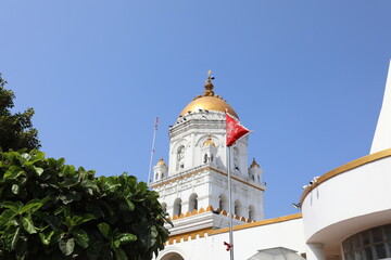 Golden-domed Hindu temple in Durban, South Africa, representing cultural heritage and spiritual architecture.