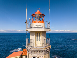 Faro y Pueblo de Cudillero en el Principado de Asturias