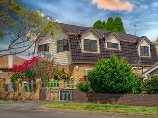 Beautiful colours of a Spring Sunset over Residential houses in inner Sydney suburb of Ashbury NSW Australia Double Brick federation house western sydney 
