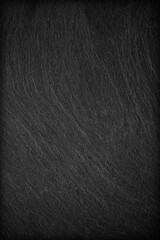 Dark grey black slate background or texture.