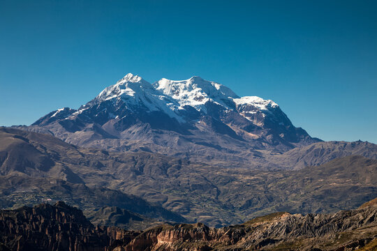 Beautiful Mount Illimani in Bolivia. Snow-capped peak. Blue sky. High mountain.